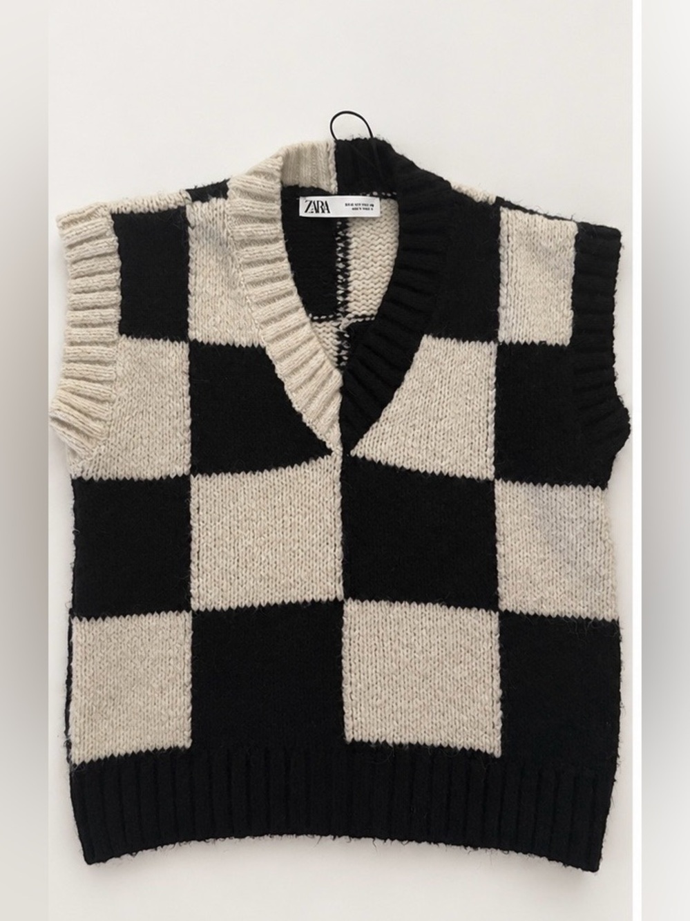 The Zara Black and White Checkerboard Knit Sweater Vest ASO Wednesday addams